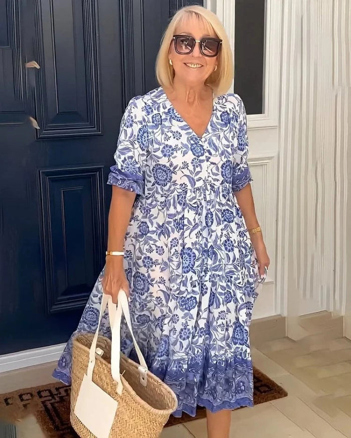 EP | Robe longue légère à l'imprimé estival et aux manches courtes au style raffiné