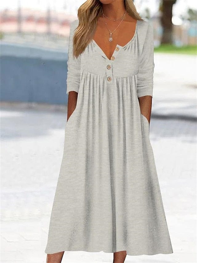 ND | Robe midi décolleté en V avec poche volantée pour femme