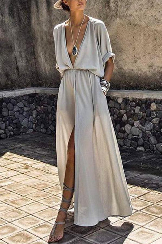 EP | Robe longue avec un profond décolleté en V, une jupe évasée et une fente raffinée pour les soirées élégantes