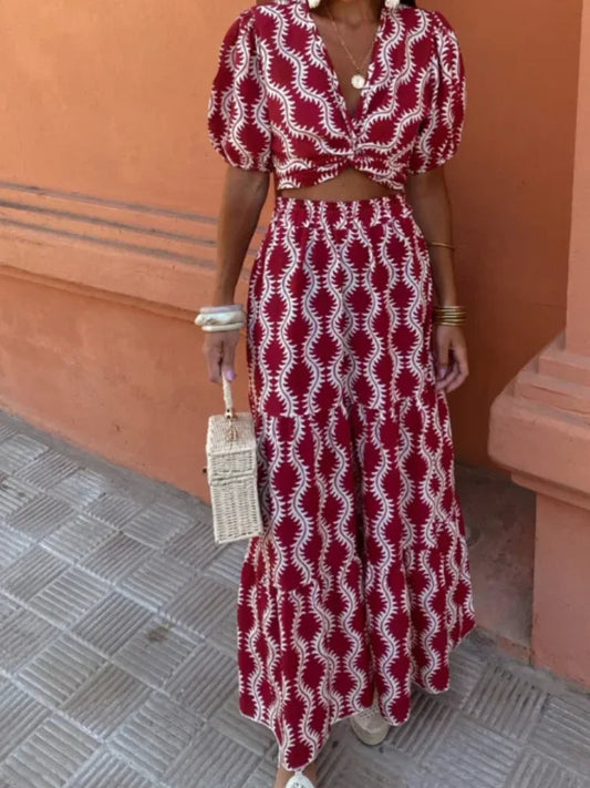 EP | Robe longue avec décolletés latéraux et ouverture stylée sur le devant