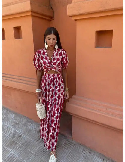 EP | Robe longue avec décolletés latéraux et ouverture stylée sur le devant